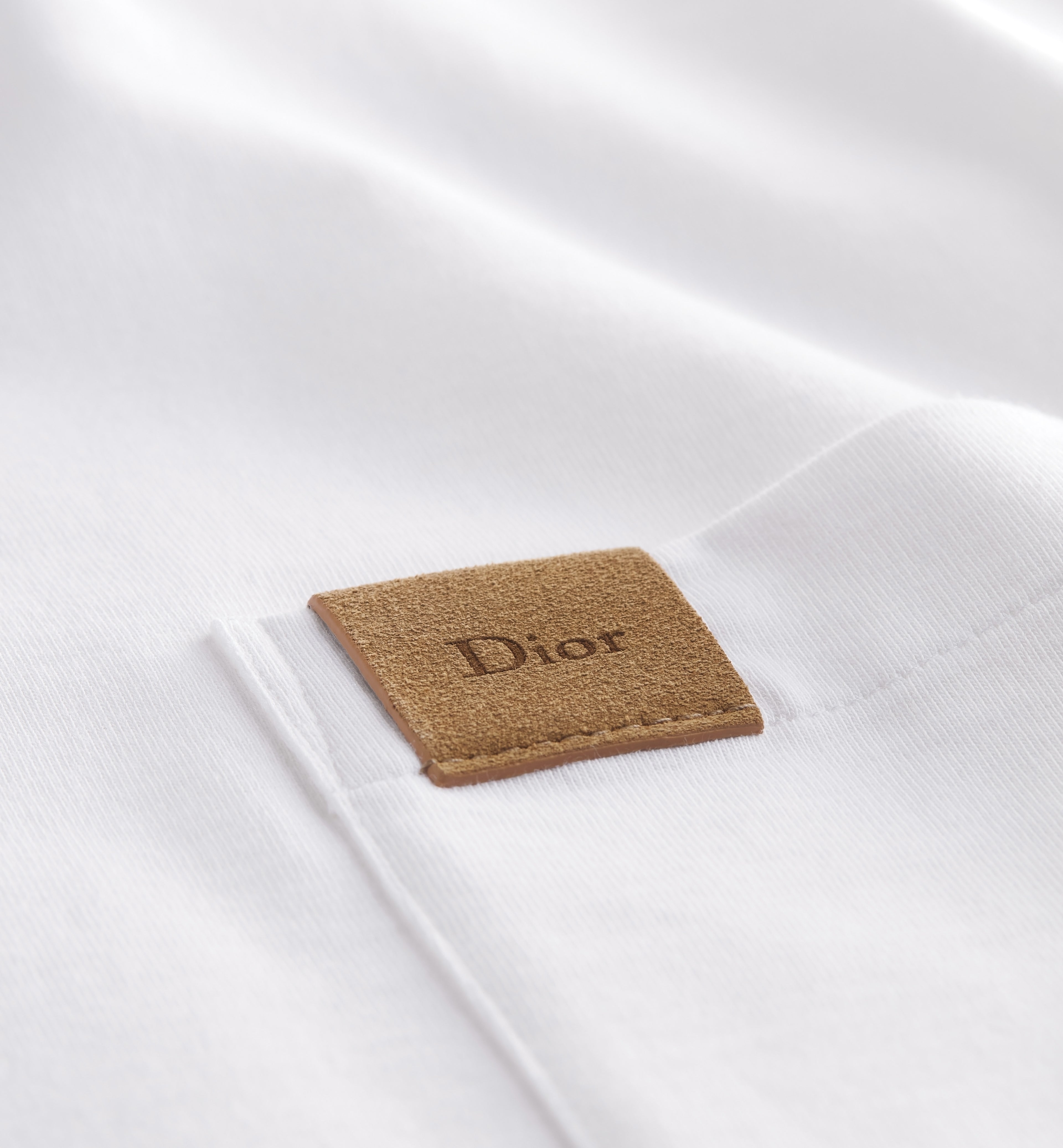 White T-shirt with Pocket and Leather Patch